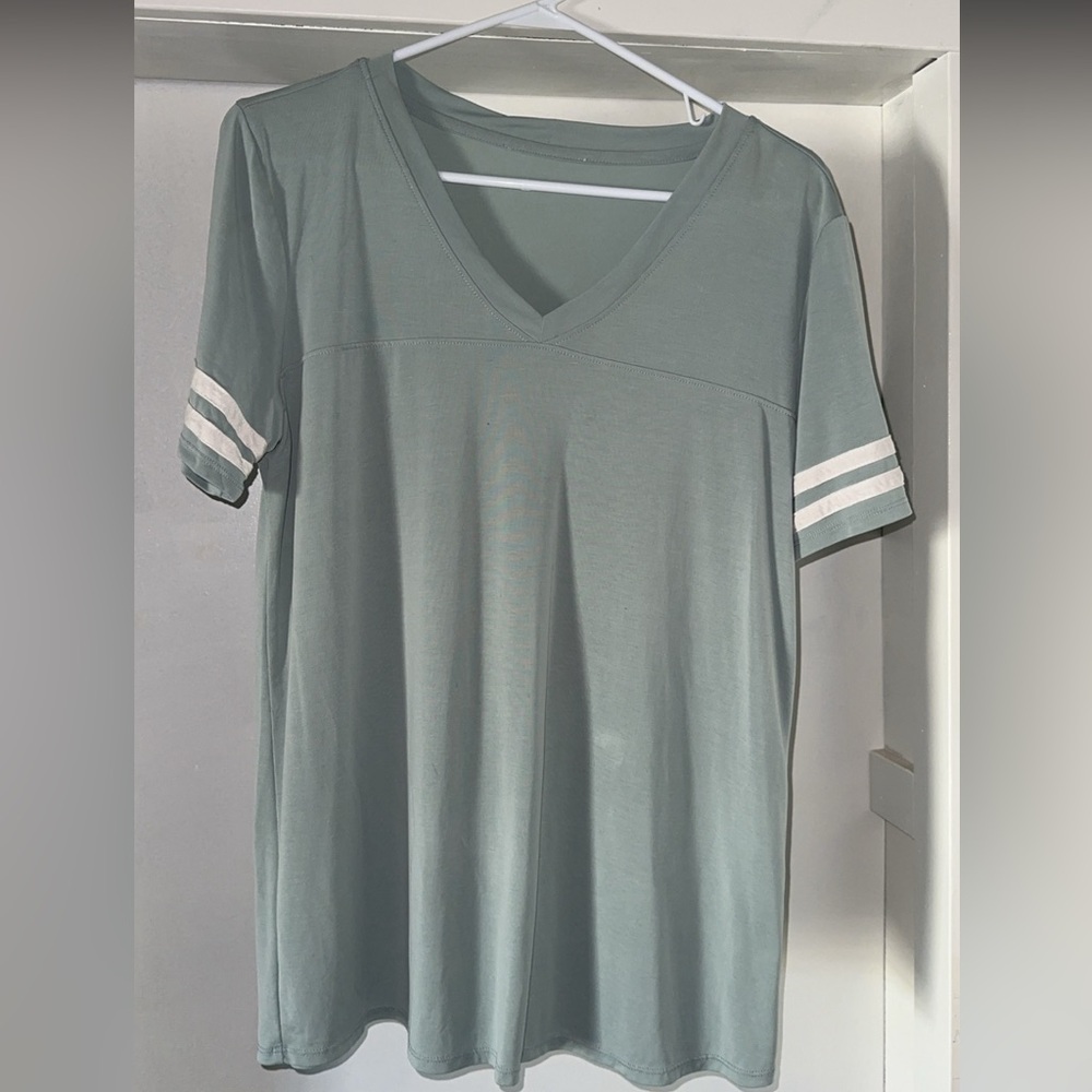 Like new mint green with white stripes t shirt
